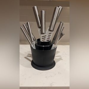 Knife set with safety covers. Rarely used. Set of 12.